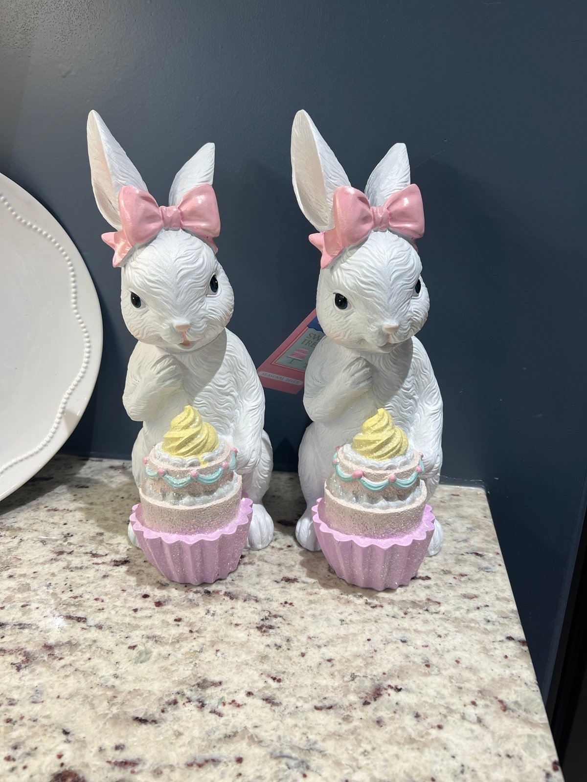 Easter bunnies with cupcakes and pink bows