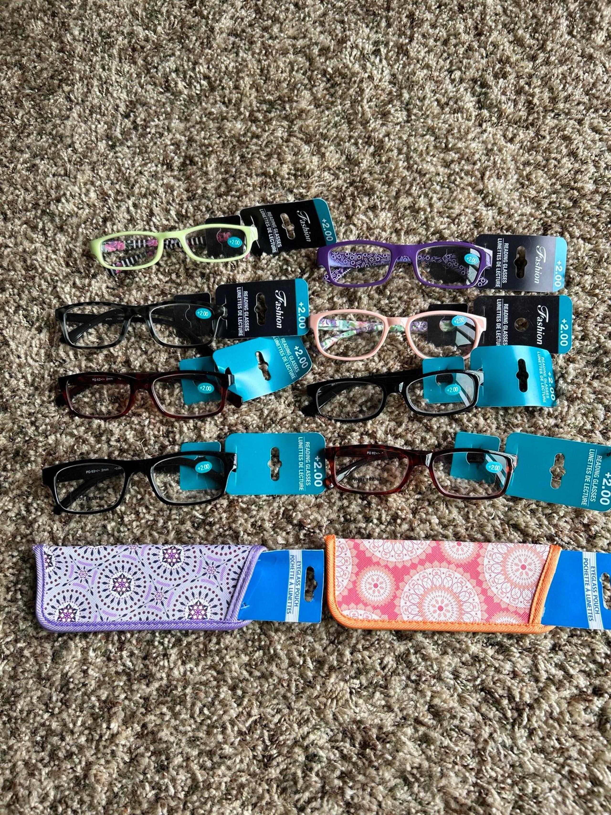 8 Reading Glasses with +2 strength and two eye glass pouches
