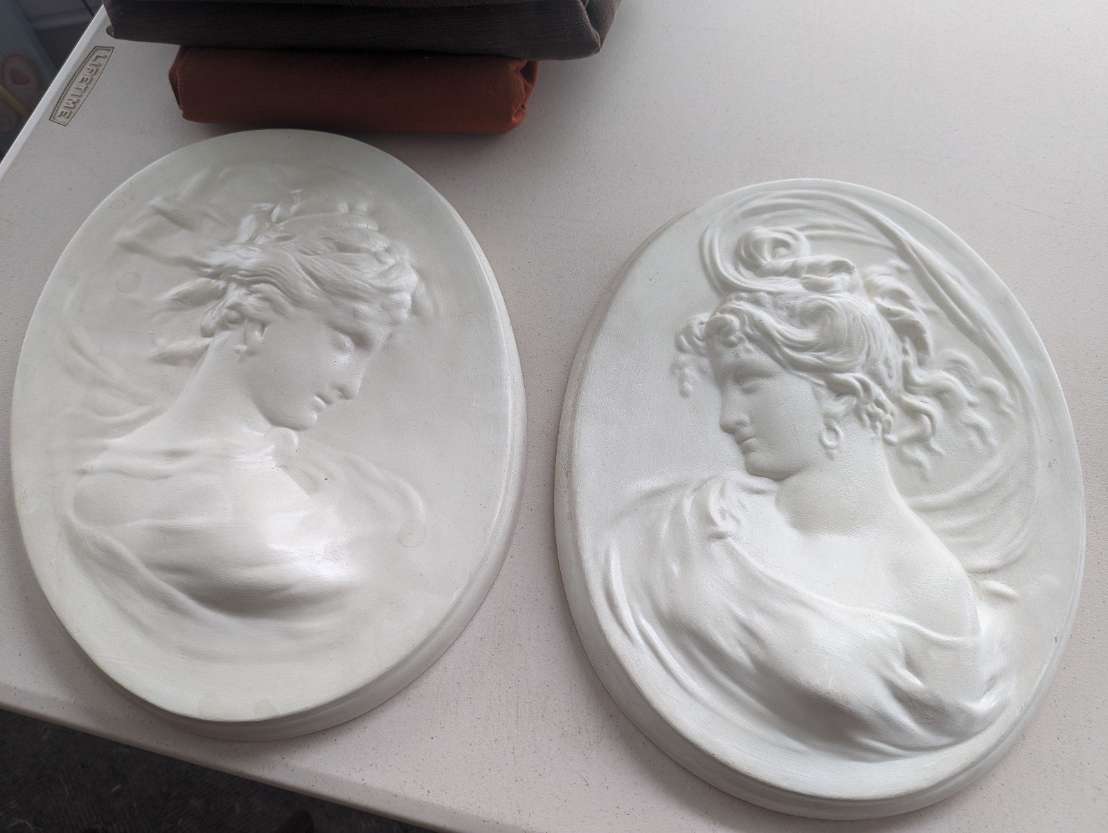 Pair of Exceptionally Good Condition Vintage Chalkware Cameo Wall Plaques