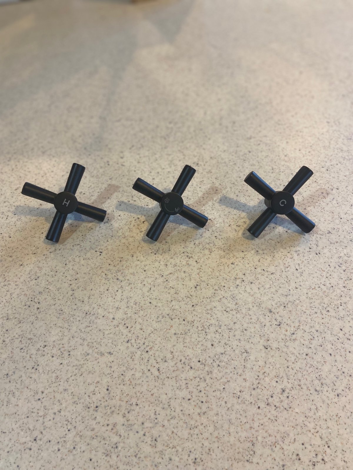 Matte black three handle shower/bath tub knobs