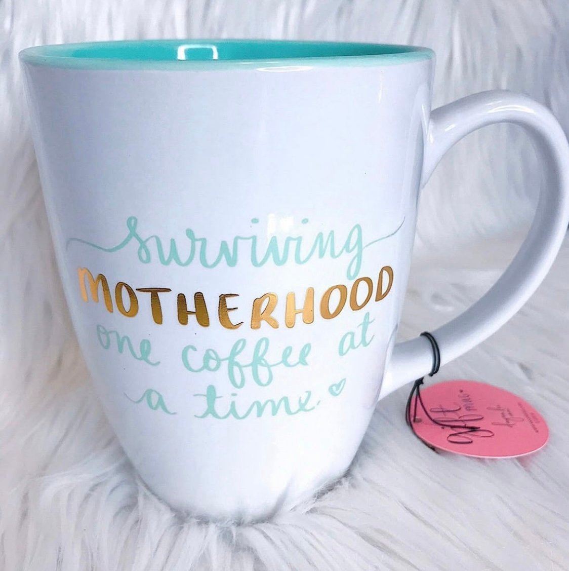 Surviving motherhood mug