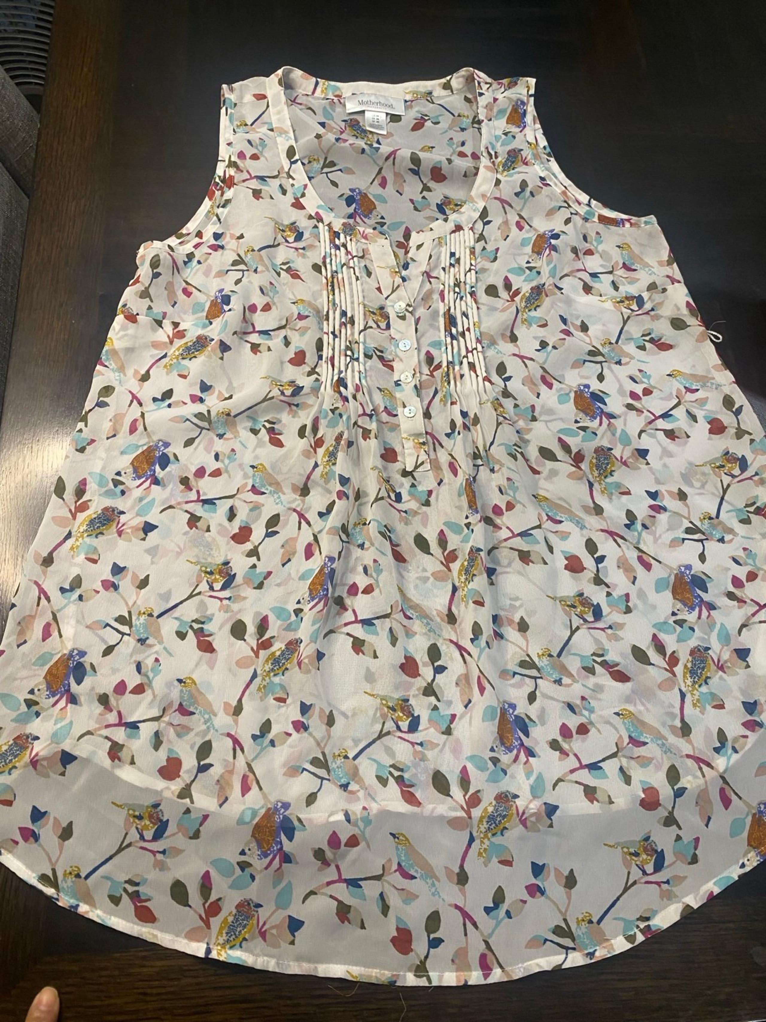 Motherhood Maternity No Sleeve blouse Size M 
USED in great condition 
100% Poly