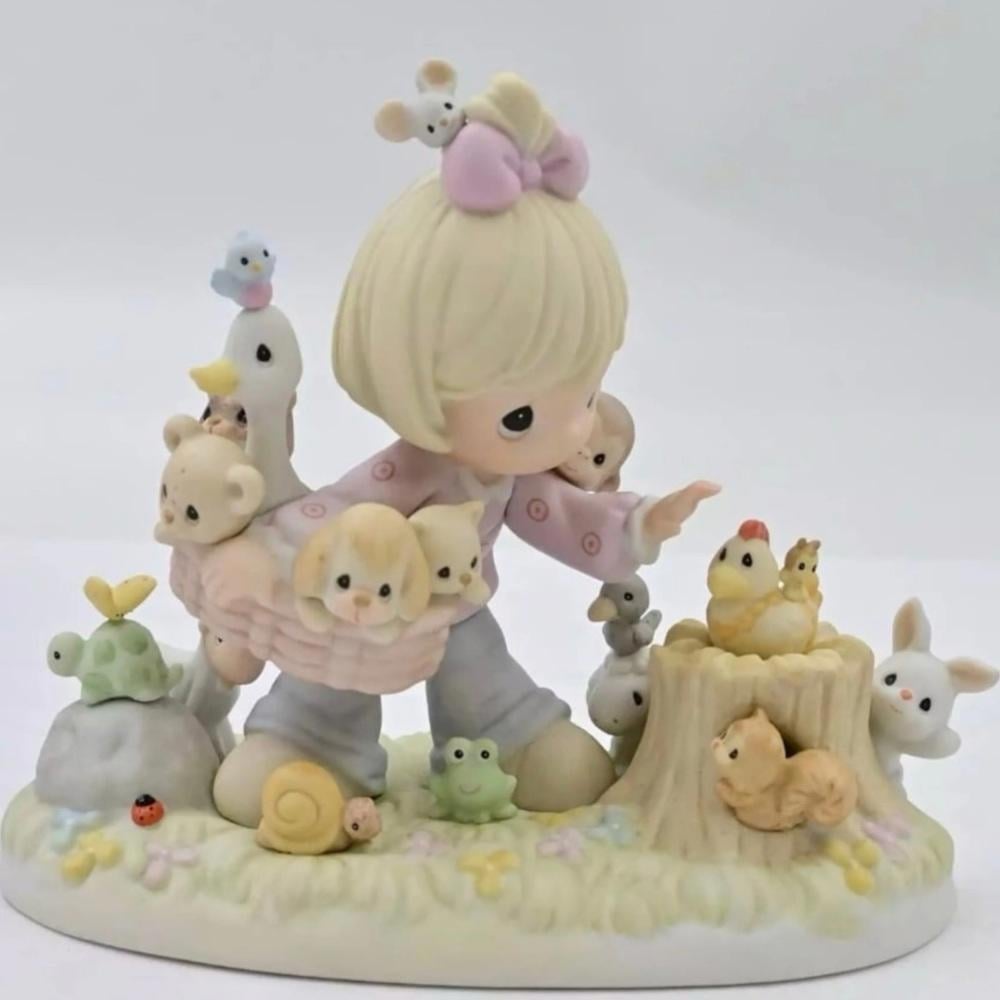 Large precious moments girl with many birds