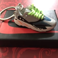 A collection of 7 Jordan key chain sneakers. Lowest cost on Internet. SAVE