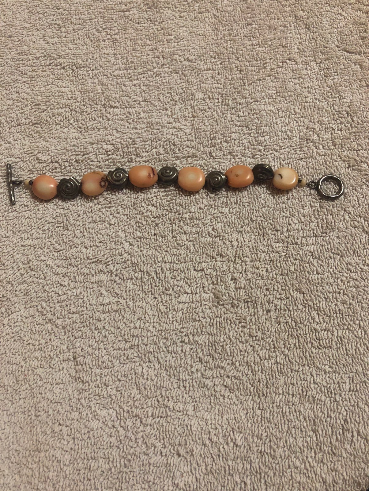 Coral and sterling sea shell bracelet