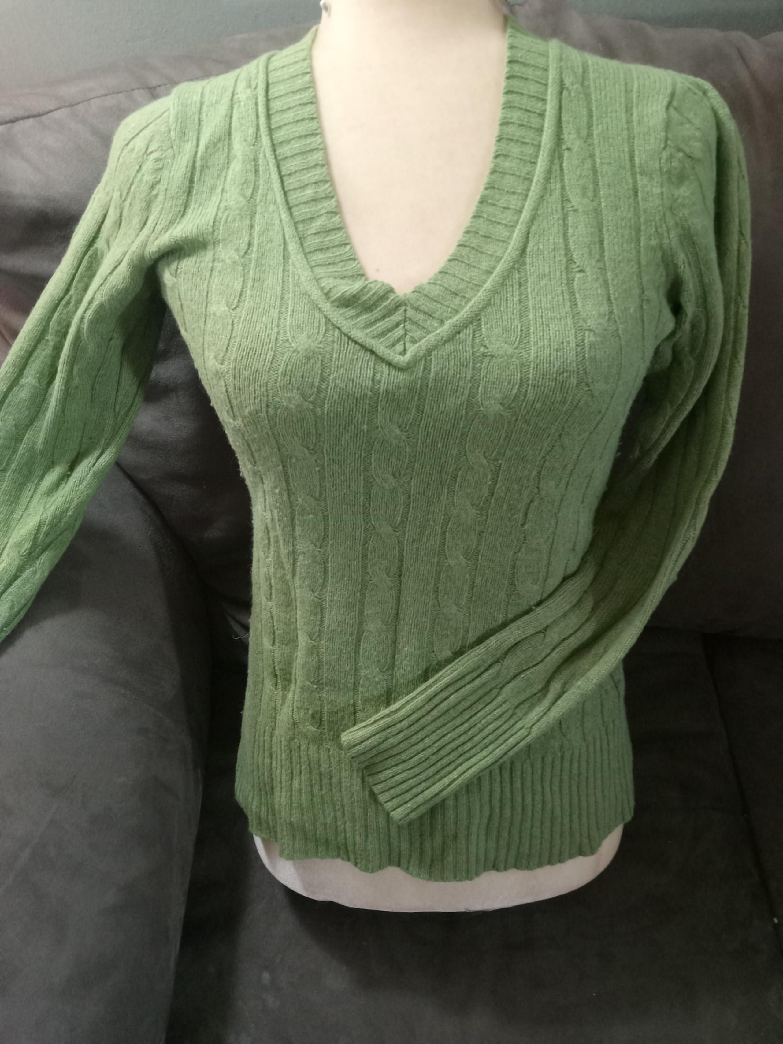 Soft knit v-neck ribbed sweater. Rayon, wool, cotton, nylon, rabbit. Like New