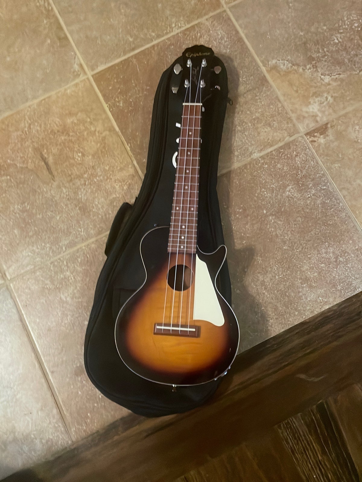 Electric epiphone ukulele it plugs into amps