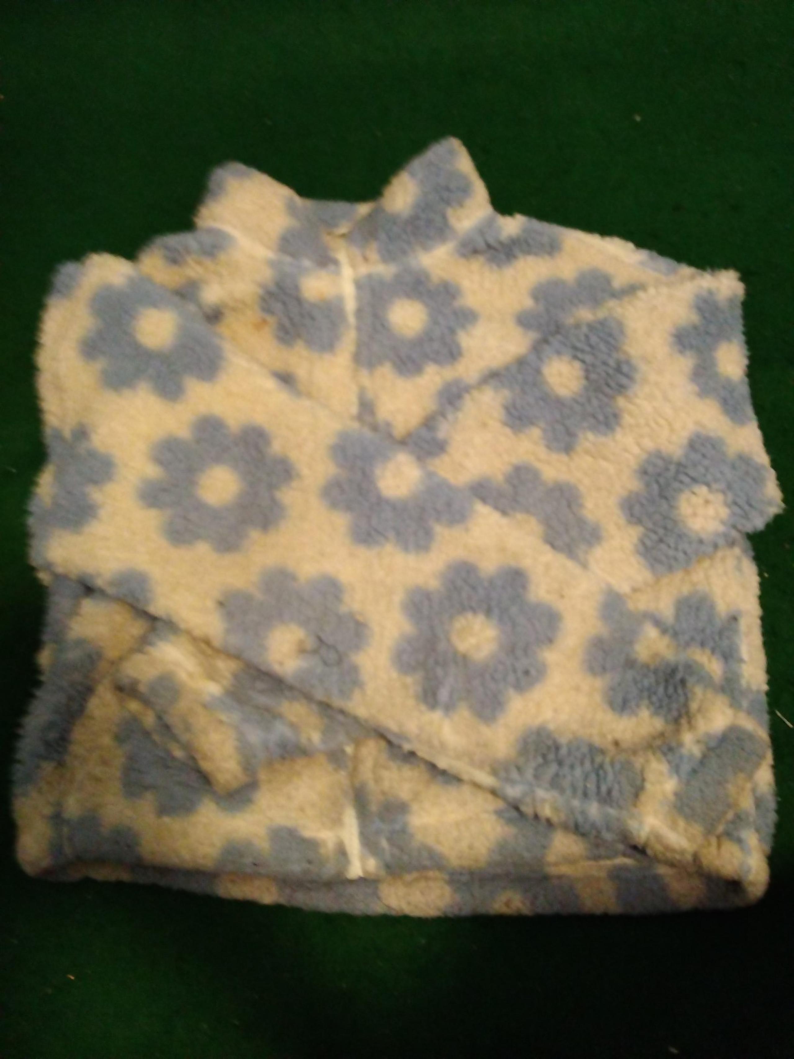 Fuzzy sweater with blue flowers