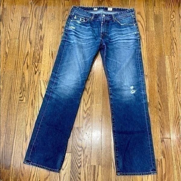 AG the PROTEGE Straight Leg Distressed Jeans. Size 33.