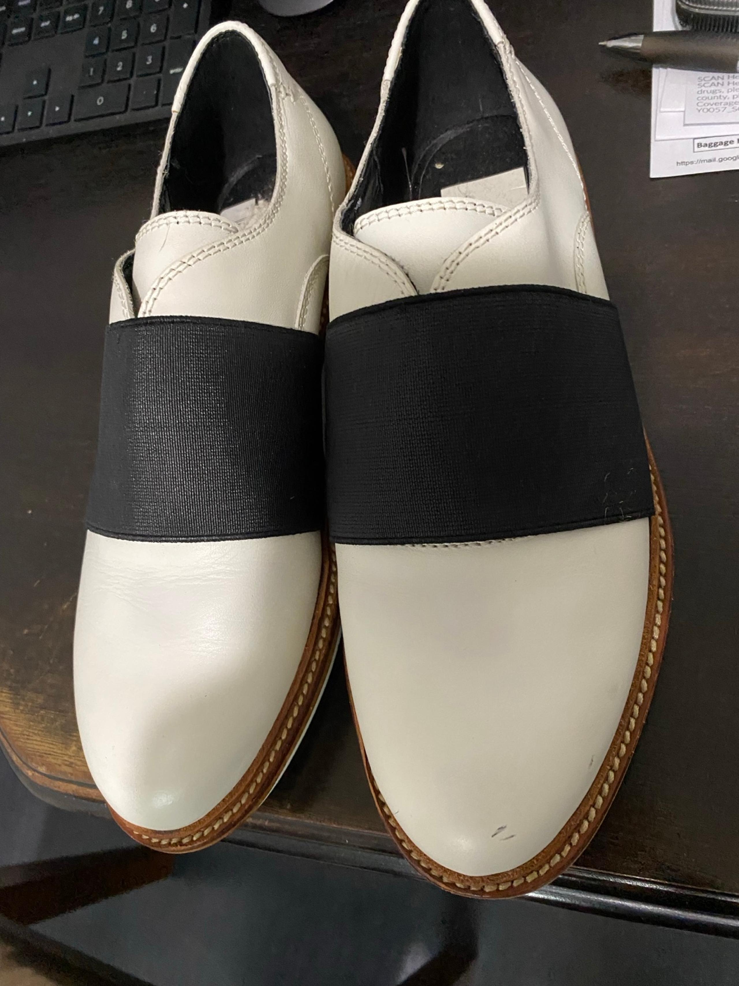 White leather and black elastic Dolce vita shoes