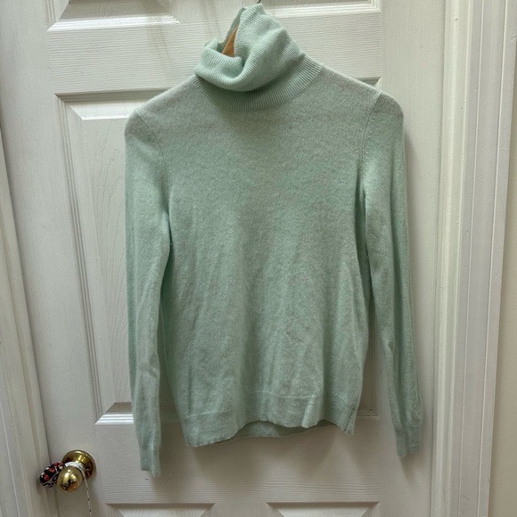 mint green turtleneck sweater