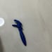 Blue pen shaped like a hand.