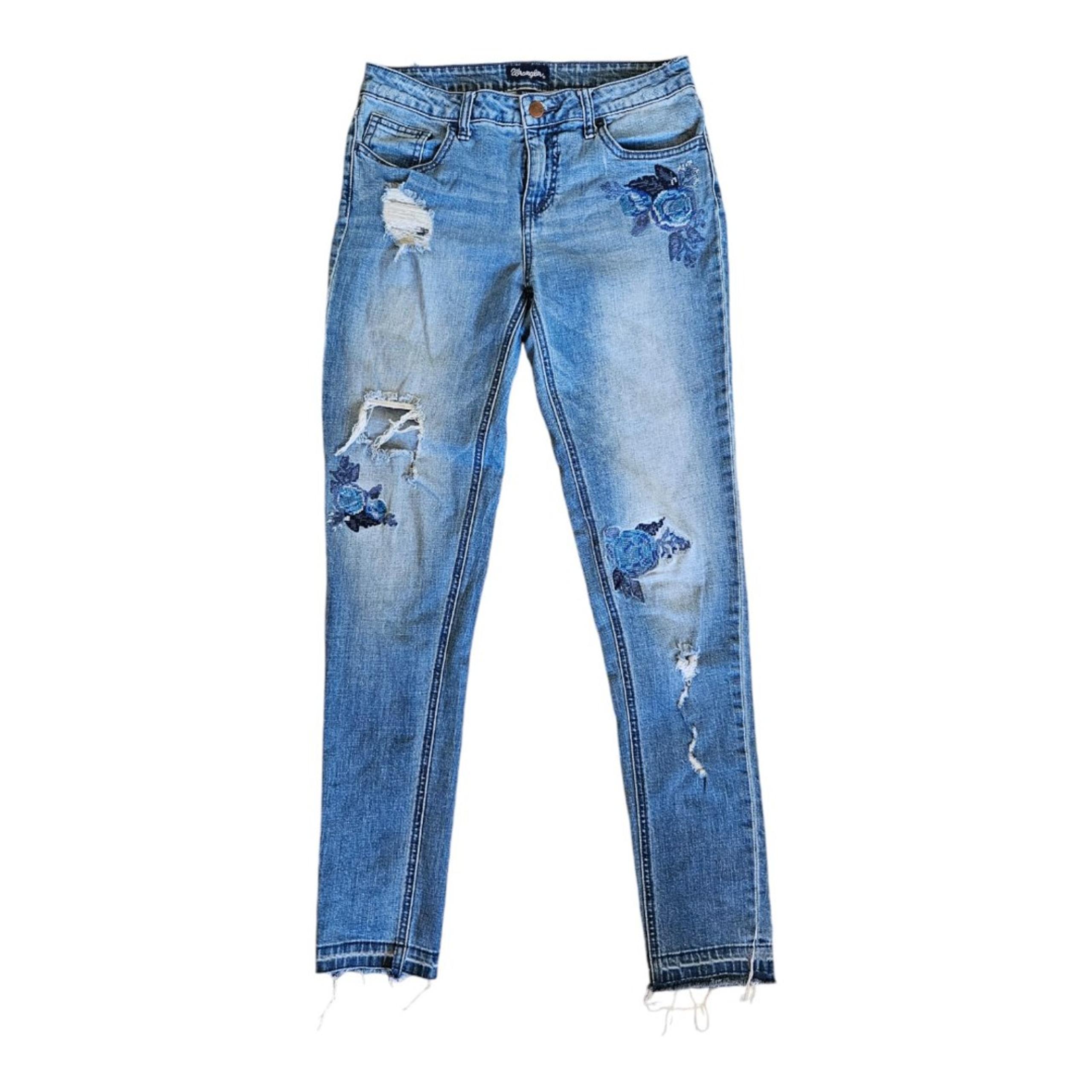 Wrangler blue Jeans Size 7/31 stretchy, slim, distressed blue flower stitching