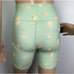 WEWOREWHAT GREEN FLORAL PRINT BIKER SHORTS