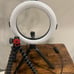 Tri pod adjustable phone holder, tripod halo light