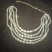 1950s Aurora 5 strand beads