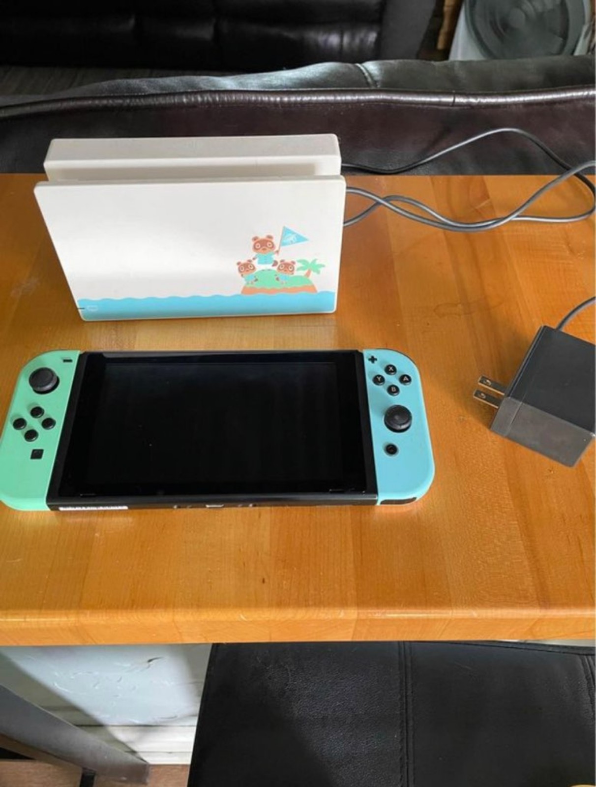 Nintendo Switch Animal Crossing: New Horizons Edition along with 4 games.