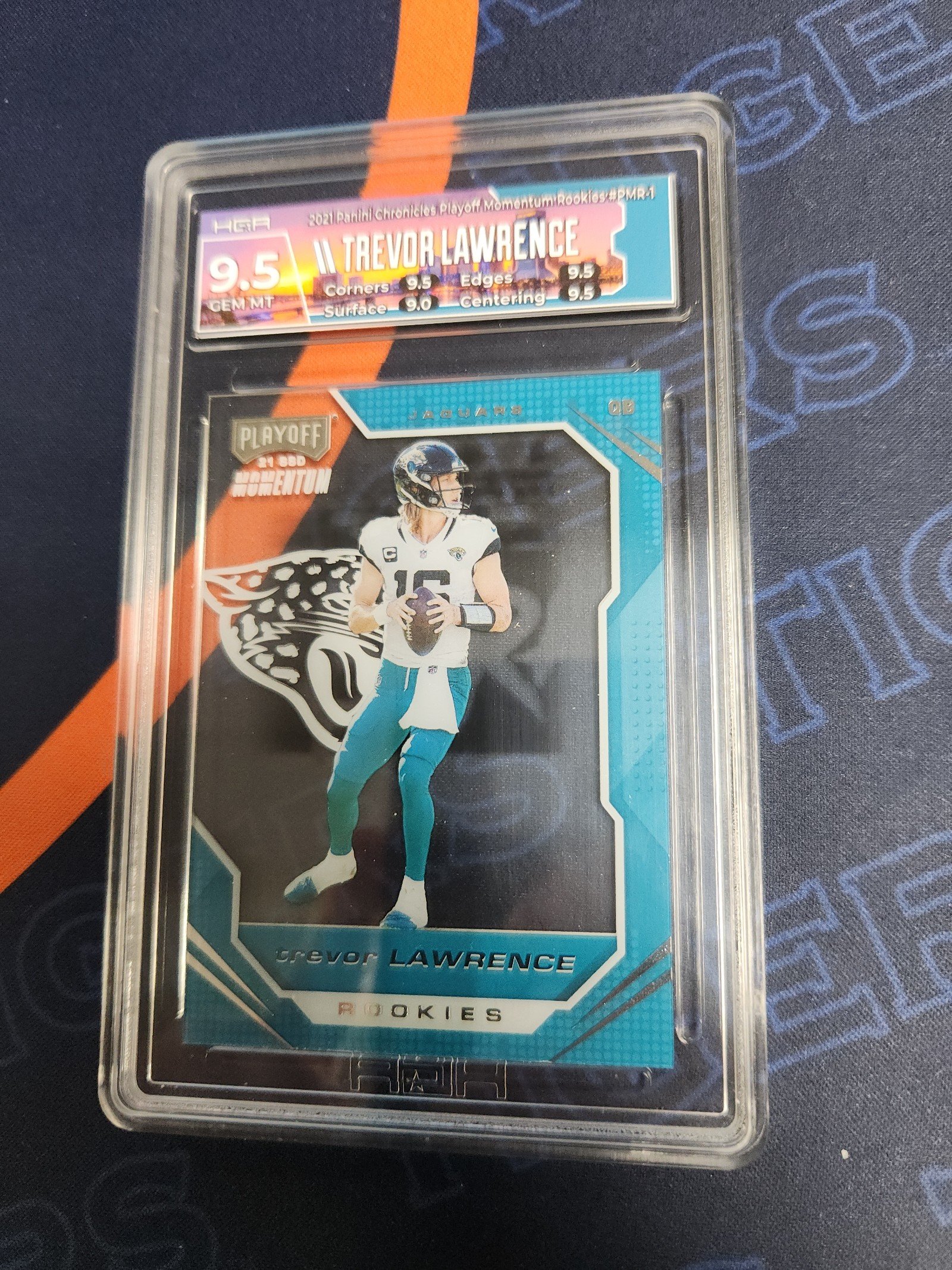 2021 Panini Chronicles Trevor Lawrence Playoff Momentum Rookies HGA 9.5 Mt+