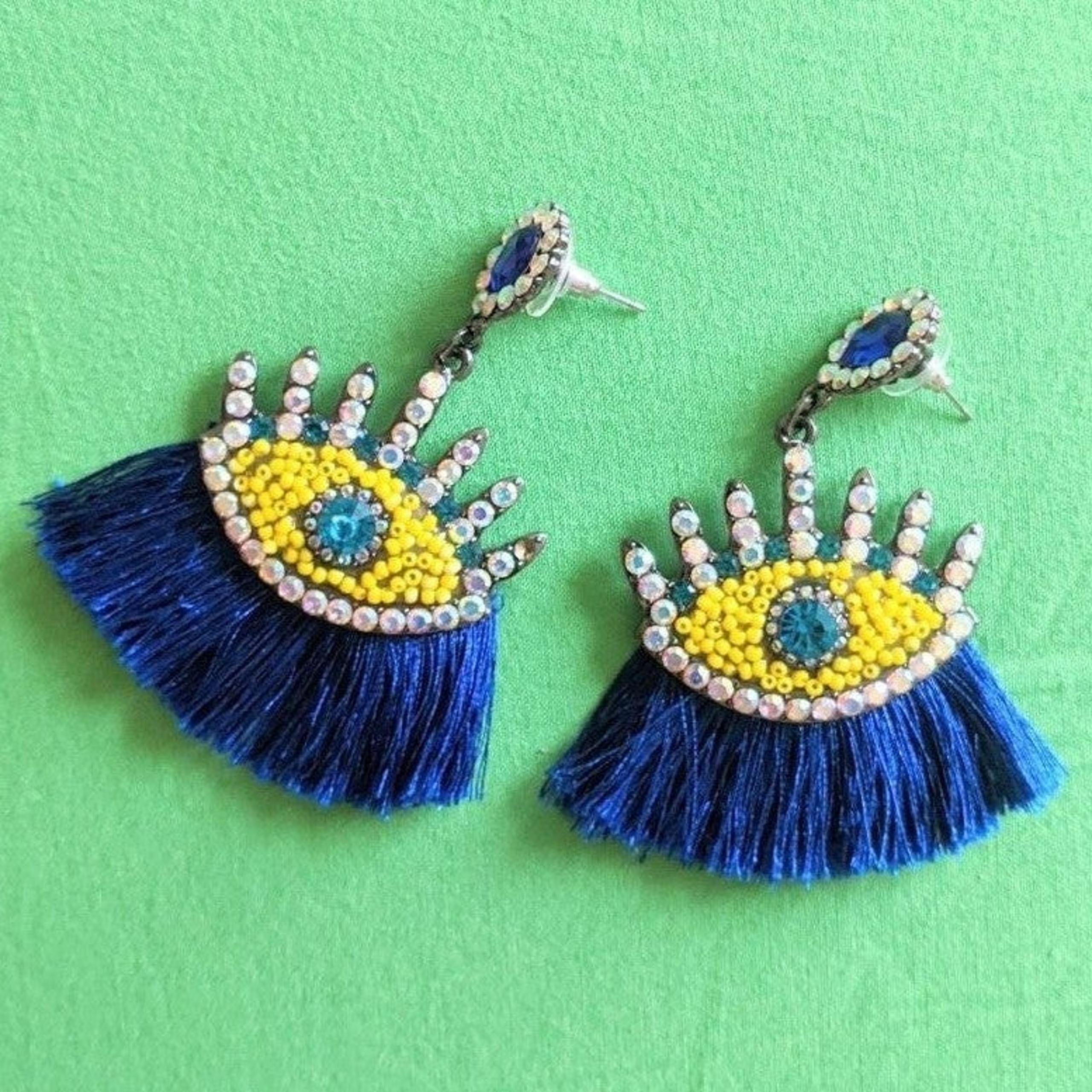Golden eye earrings