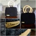 Handmade handbag with two wooden handles