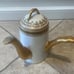 Antique J.P.L France J. Pouyat Limoges Porcelain teapot w/ side handle and lid.