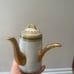 Antique J.P.L France J. Pouyat Limoges Porcelain teapot w/ side handle and lid.