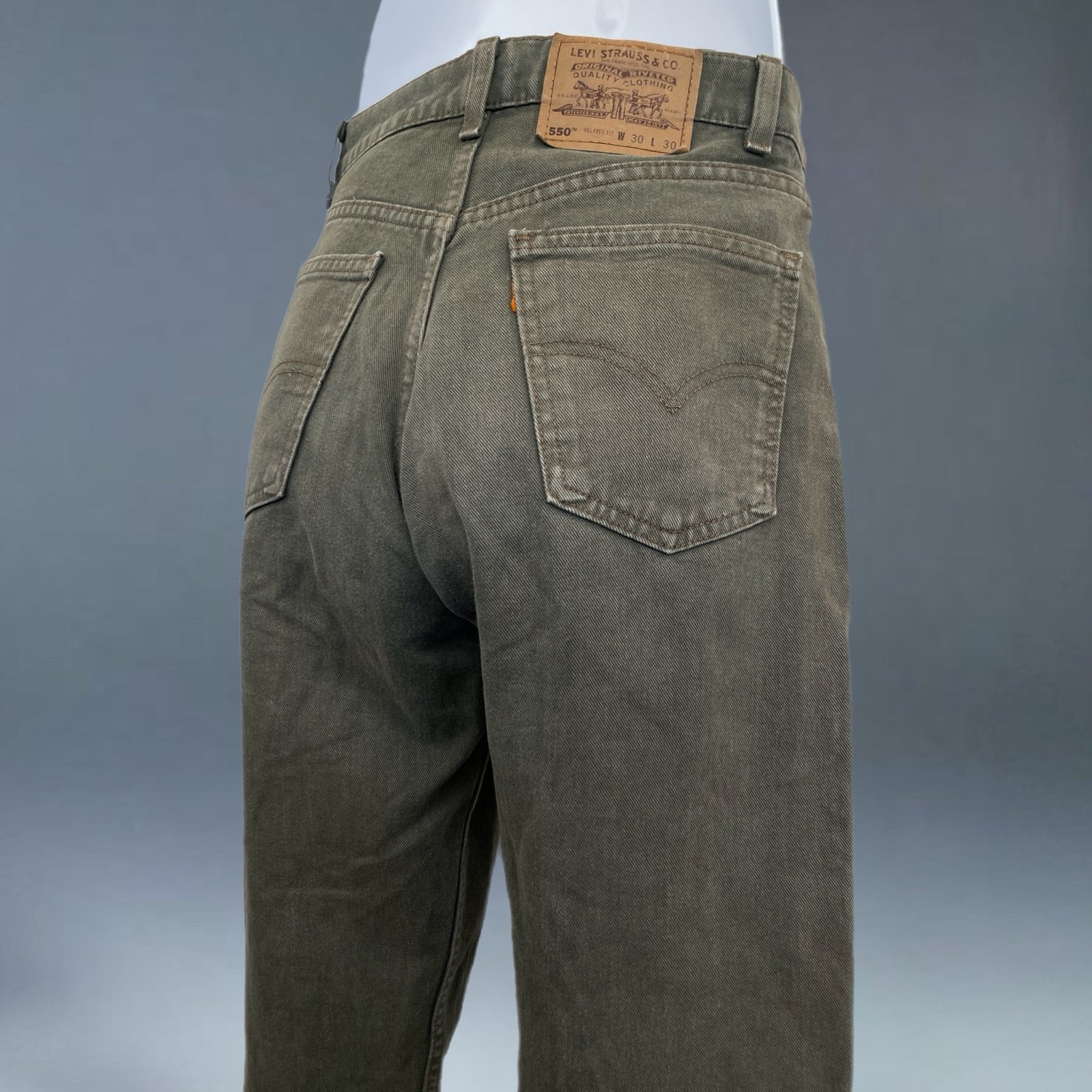 vintage 90s green 550s levis jeans
