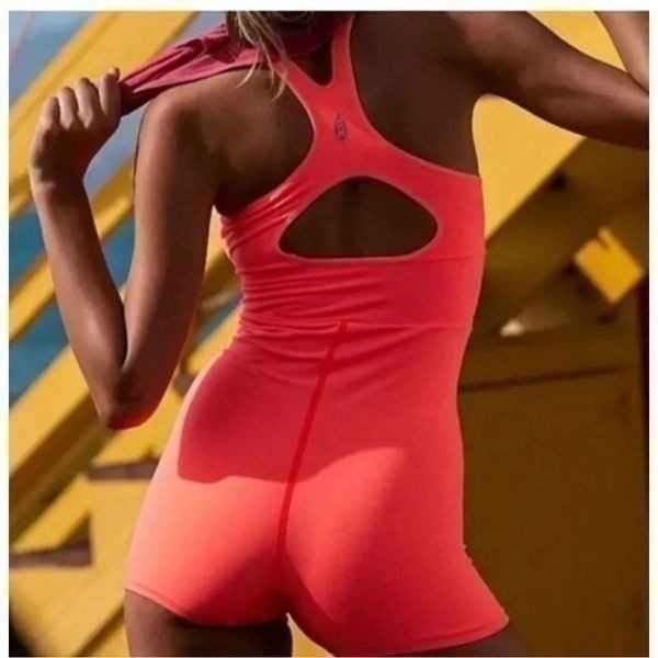 Free People Movement Every Single Time Runsie in Neon Coral sz XS/S