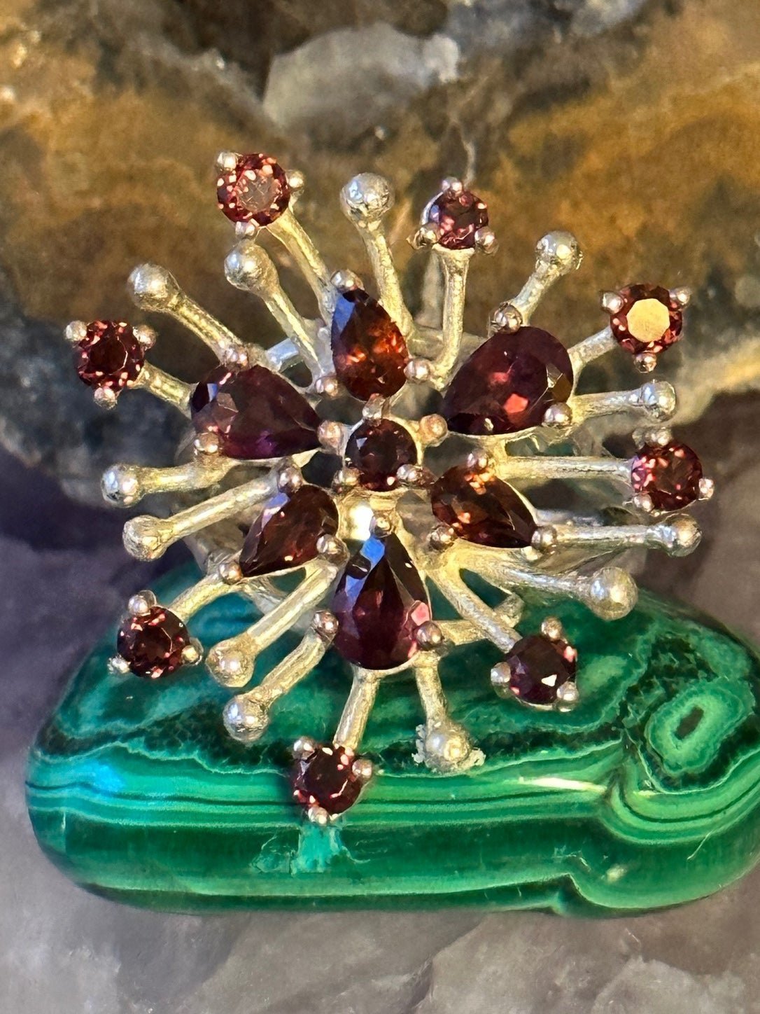 Garnet starbust sterling silver ring