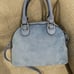 Juicy couture heritage satchel slate blue color with change purse.