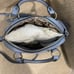 Juicy couture heritage satchel slate blue color with change purse.