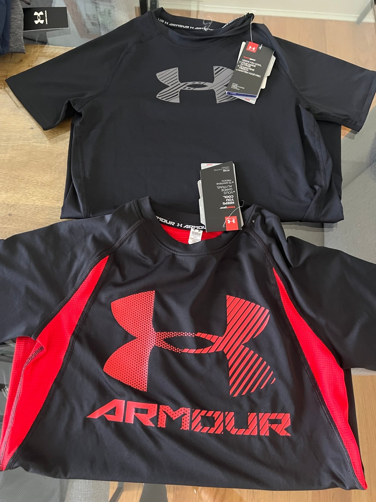 2 under armour shirts