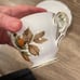Vintage Royal Vale England bone china teacup and saucer with display stand