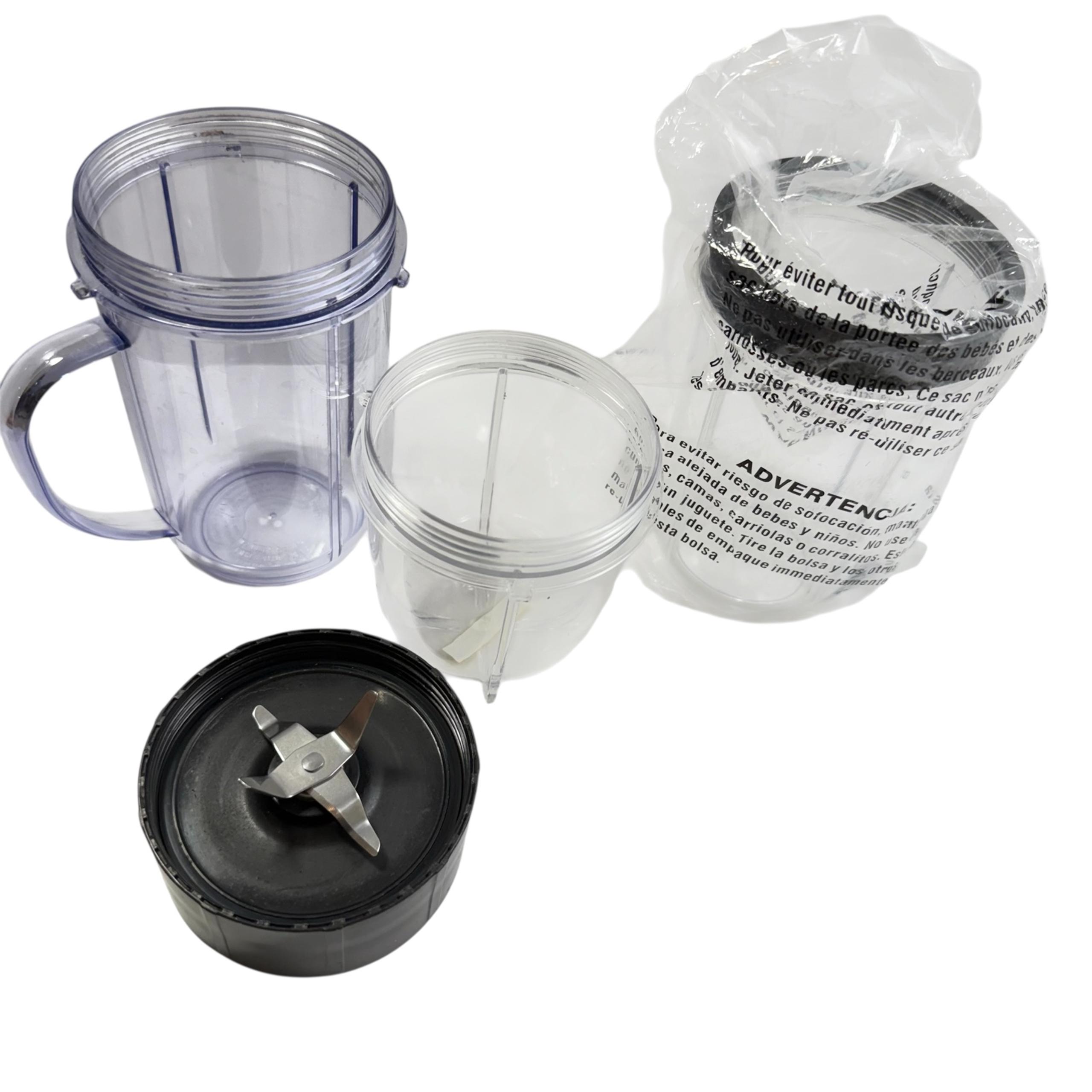 Magic Bullet & Replacement Parts–2 Cups, 1 Blade, 1 small cup–1 New, others used