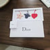 Dior handbag charms