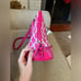 Dooney & Bourke leather zip zip satchel in pink and white lattice