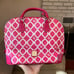 Dooney & Bourke leather zip zip satchel in pink and white lattice