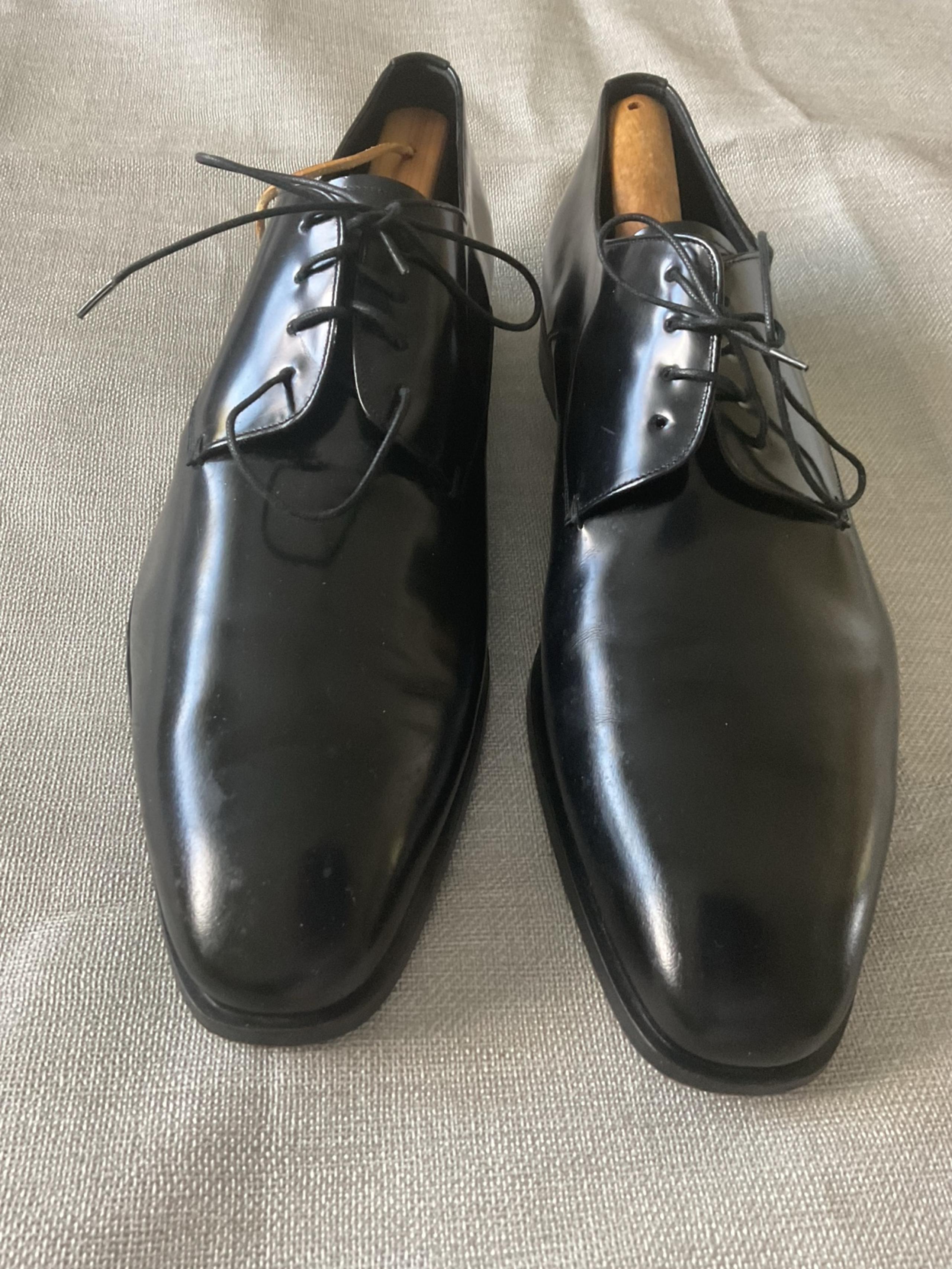 Prada black leather men’s dress shoes
