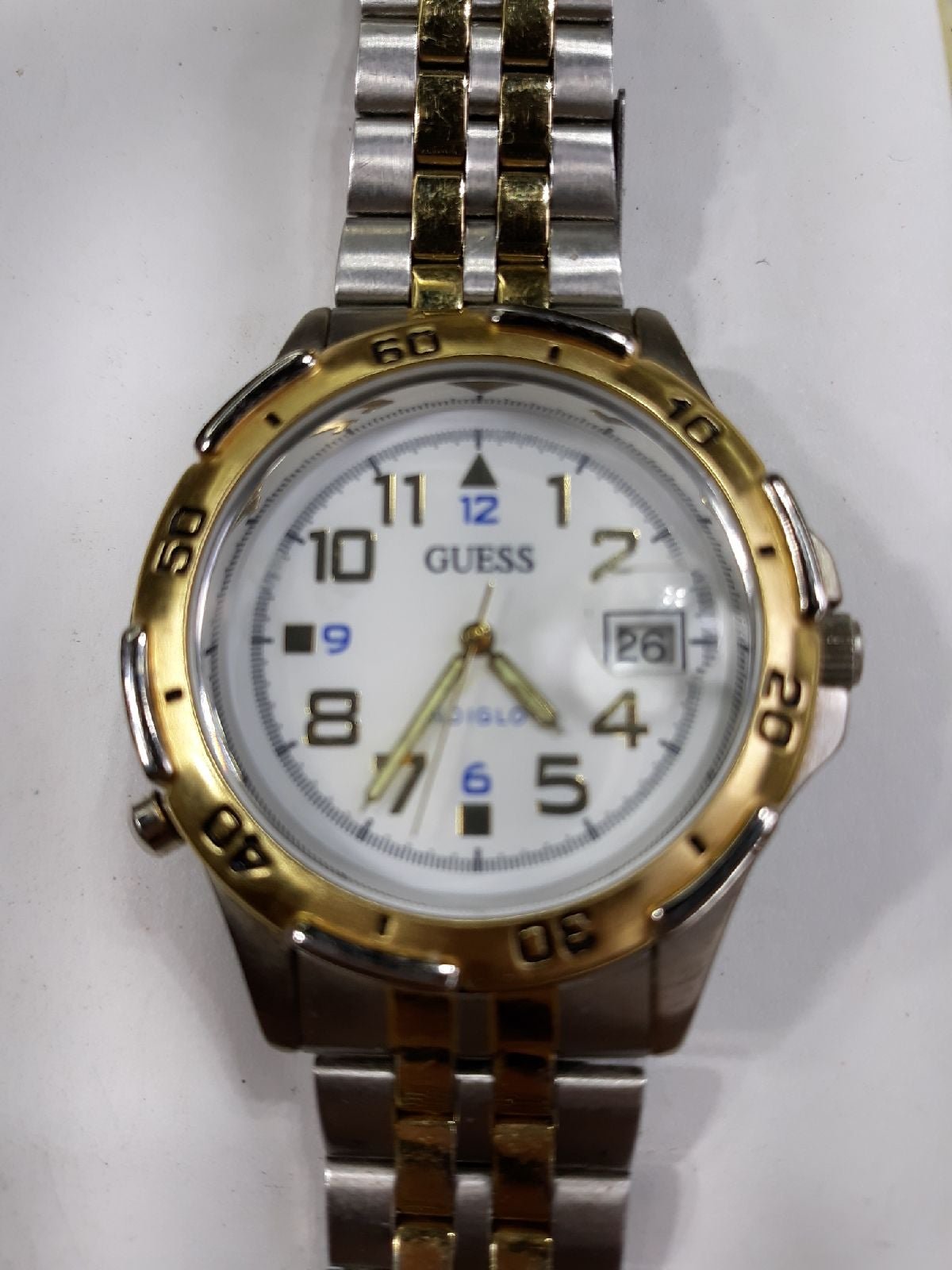 Guess Men's Indiglo Date Watch. 56