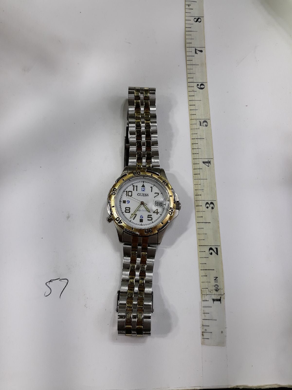Guess Men's Indiglo Date Watch. 56