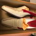 Tod’s cream and red mules size 8.5
