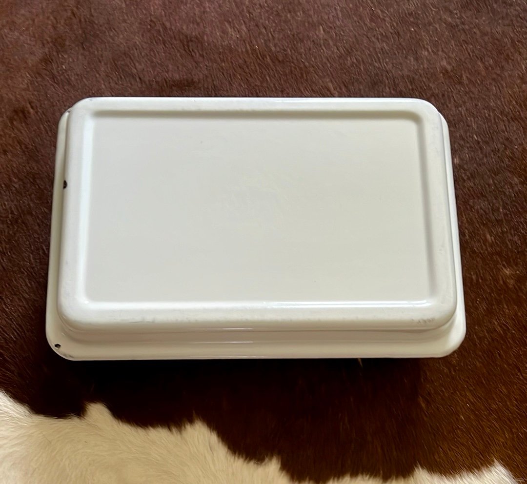 White enamelware dish with lid