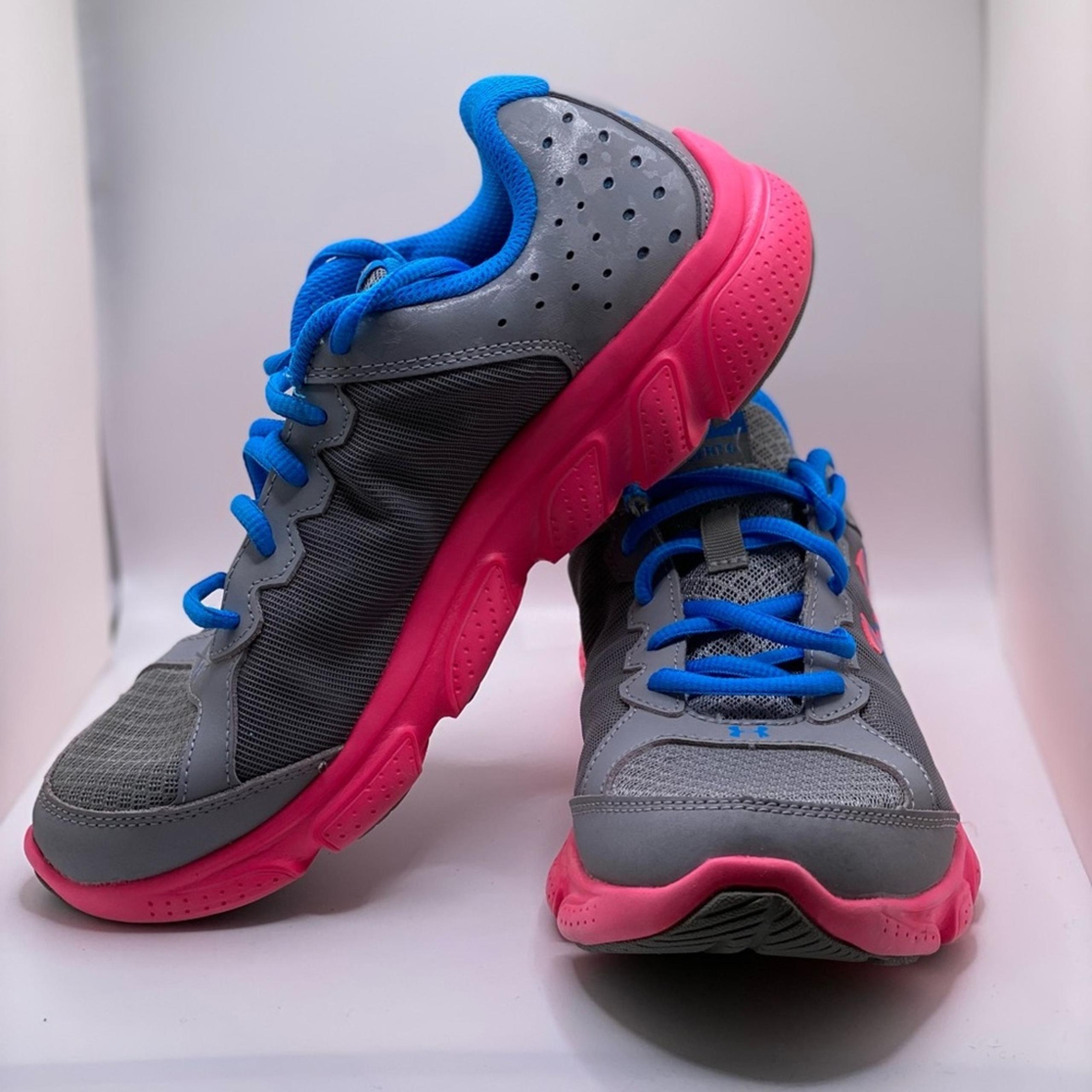 Big girls under armor tennis shoes, l size 5.5, colors are pink and blue