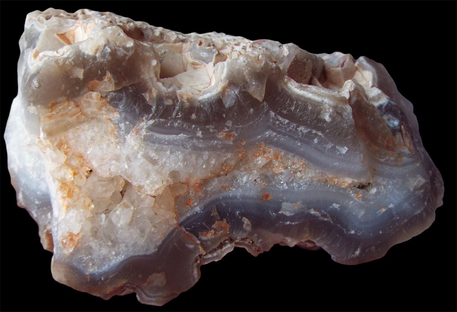 raw opal, agate, clear, and ferruginous quartz crystal cluster