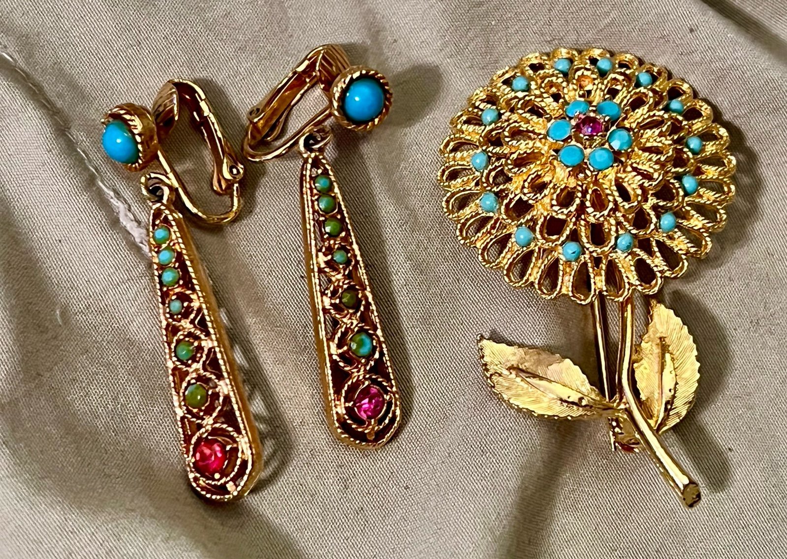 Vintage gold tone flower brooch with faux turquoise beads and matching earrings