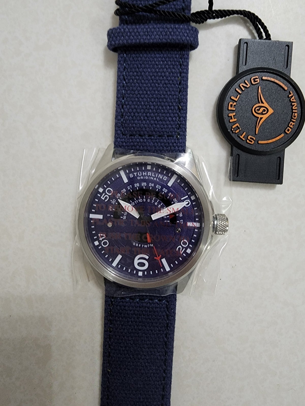Stuhrling Mens sporty watch. Model 452. Blue face, leather band.