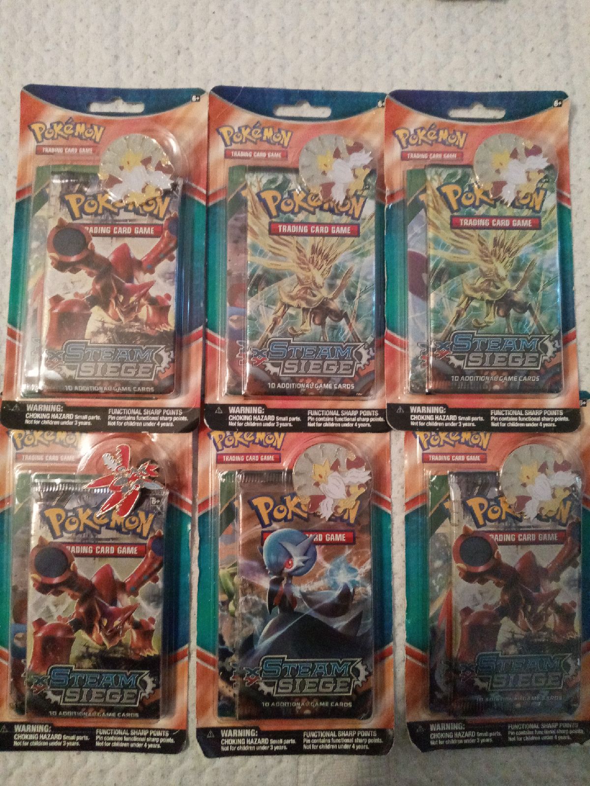 Pokemon booster pack with trading pin