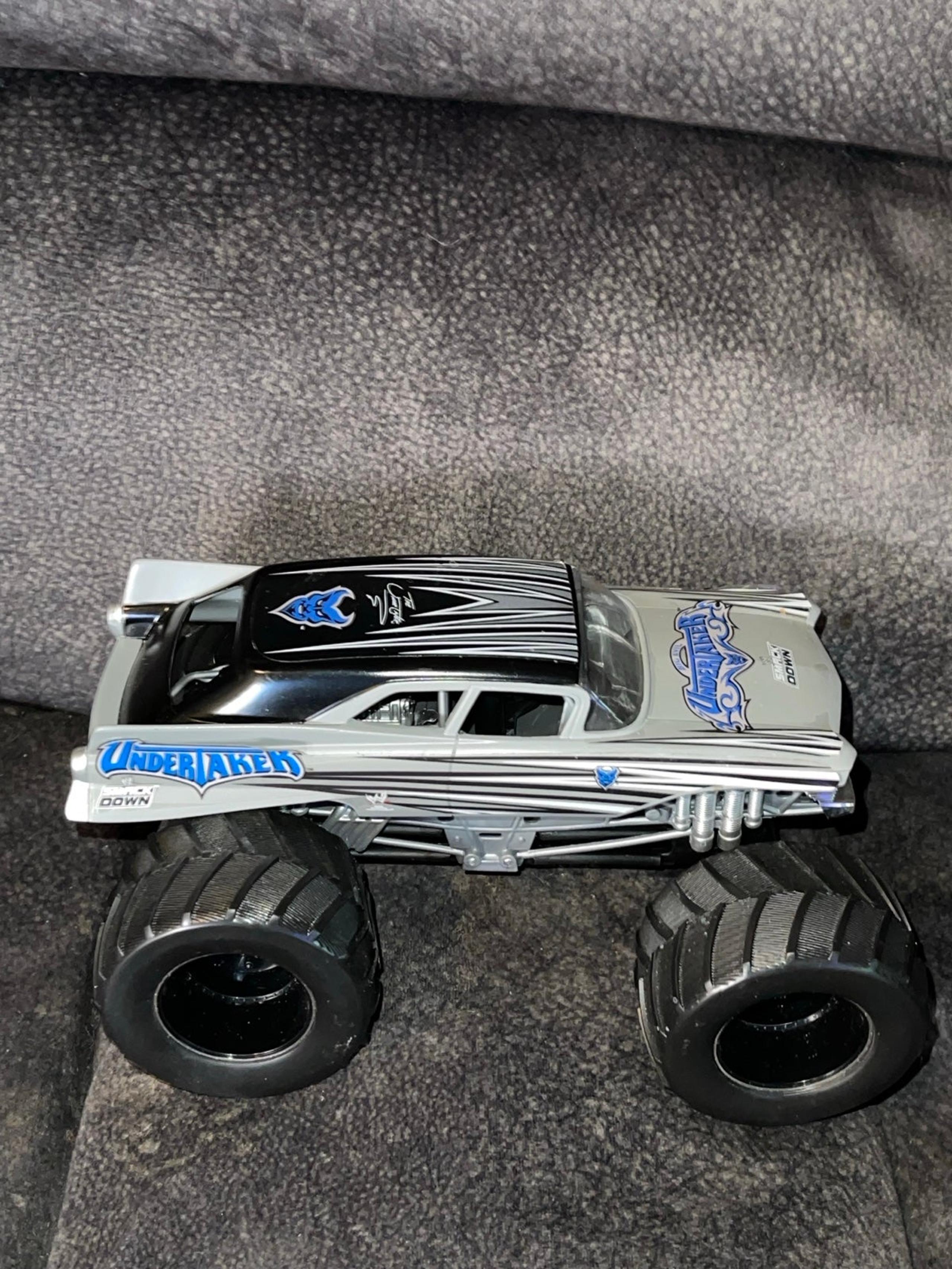 WWE Wrestling Hot Wheels The Undertaker Monster Truck Vintage Classic Brand New.
