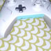 A phone and a white and teal controoler