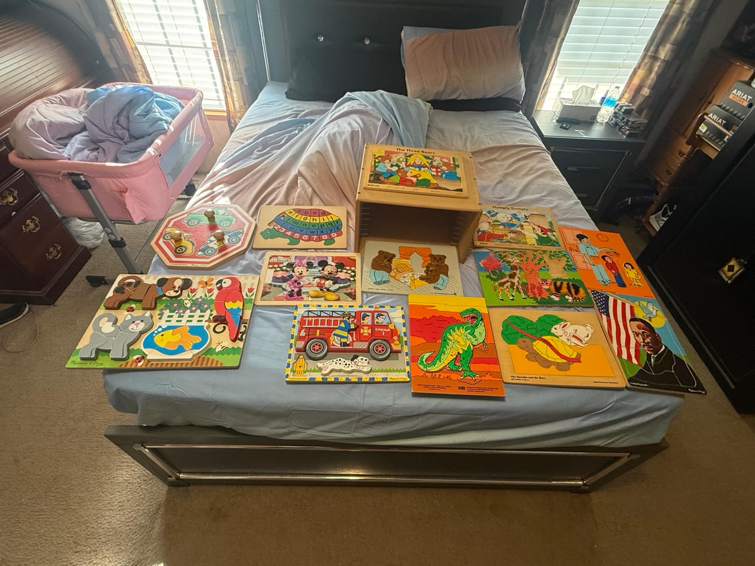 Huge lot of 13 children’s wooden puzzle’s and puzzle holder! Most not complete!